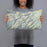 Person holding 20x12 Custom Eureka Mountain Colorado Map Throw Pillow in Woodblock