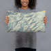 Person holding 20x12 Custom Eureka Mountain Colorado Map Throw Pillow in Woodblock