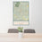 24x36 Eureka Springs Arkansas Map Print Portrait Orientation in Woodblock Style Behind 2 Chairs Table and Potted Plant