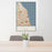 24x36 Evanston Illinois Map Print Portrait Orientation in Woodblock Style Behind 2 Chairs Table and Potted Plant