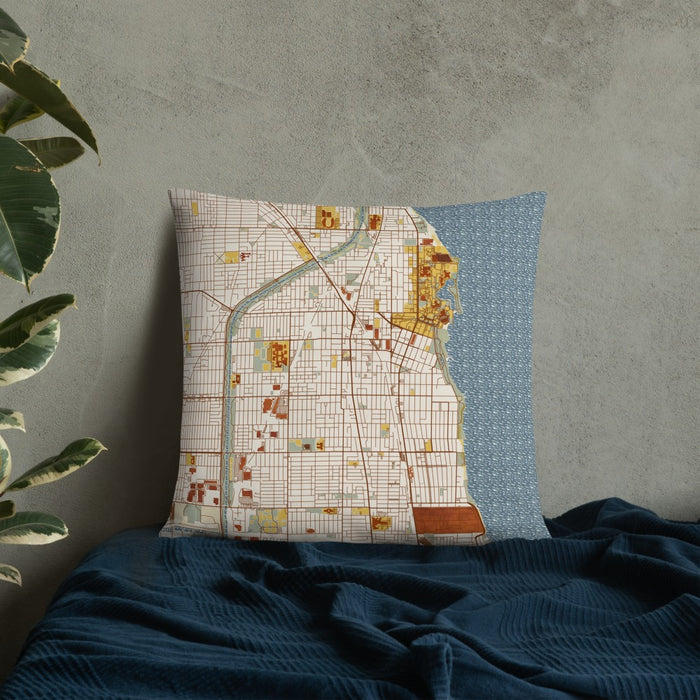 Custom Evanston Illinois Map Throw Pillow in Woodblock on Bedding Against Wall