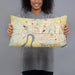 Person holding 20x12 Custom Evansville Indiana Map Throw Pillow in Woodblock