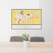 24x36 Evansville Wisconsin Map Print Lanscape Orientation in Woodblock Style Behind 2 Chairs Table and Potted Plant