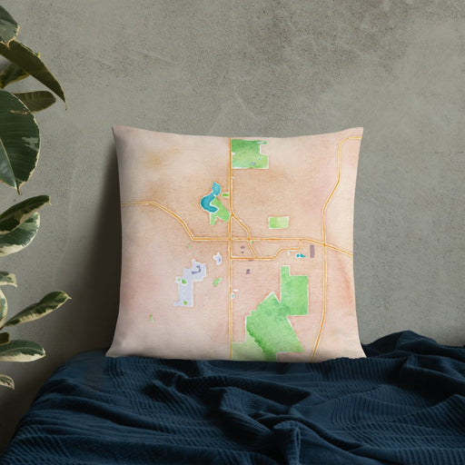 Custom Evansville Wisconsin Map Throw Pillow in Watercolor on Bedding Against Wall