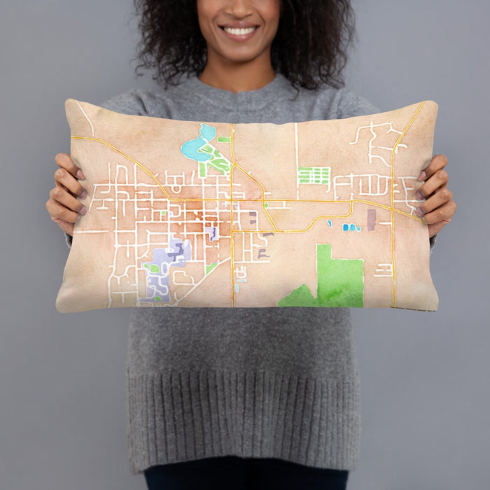 Person holding 20x12 Custom Evansville Wisconsin Map Throw Pillow in Watercolor