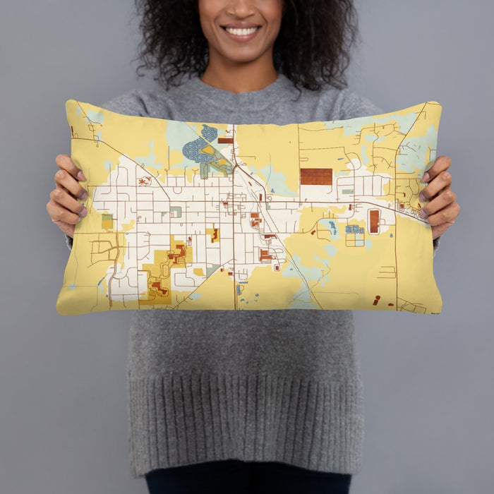 Person holding 20x12 Custom Evansville Wisconsin Map Throw Pillow in Woodblock