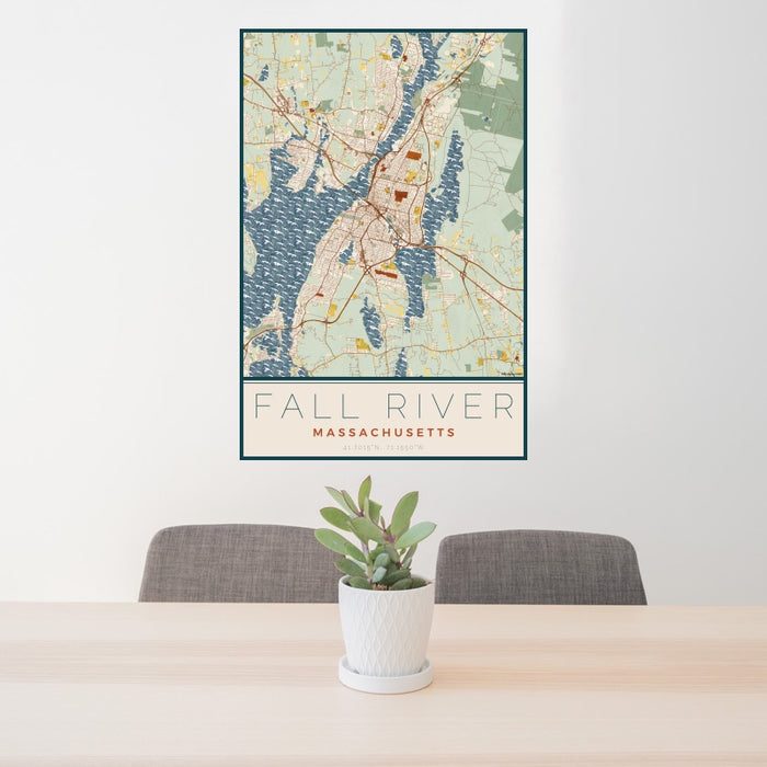 24x36 Fall River Massachusetts Map Print Portrait Orientation in Woodblock Style Behind 2 Chairs Table and Potted Plant