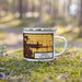 Right View Custom Fargo North Dakota Map Enamel Mug in Ember on Grass With Trees in Background
