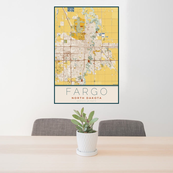 24x36 Fargo North Dakota Map Print Portrait Orientation in Woodblock Style Behind 2 Chairs Table and Potted Plant