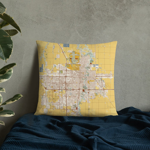 Custom Fargo North Dakota Map Throw Pillow in Woodblock on Bedding Against Wall
