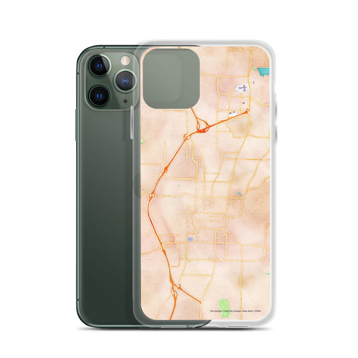 Custom Fayetteville Arkansas Map Phone Case in Watercolor on Table with Laptop and Plant