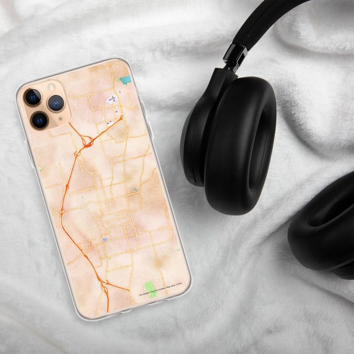 Custom Fayetteville Arkansas Map Phone Case in Watercolor on Table with Black Headphones