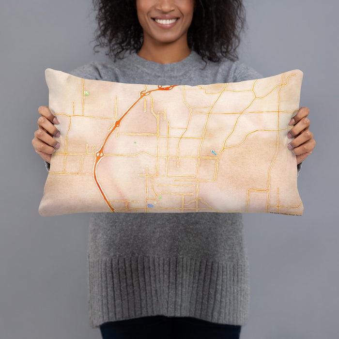 Person holding 20x12 Custom Fayetteville Arkansas Map Throw Pillow in Watercolor