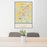 24x36 Fayetteville Arkansas Map Print Portrait Orientation in Woodblock Style Behind 2 Chairs Table and Potted Plant