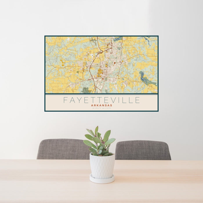 24x36 Fayetteville Arkansas Map Print Landscape Orientation in Woodblock Style Behind 2 Chairs Table and Potted Plant