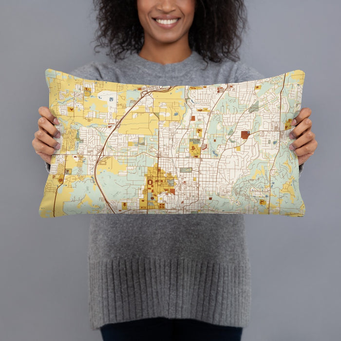 Person holding 20x12 Custom Fayetteville Arkansas Map Throw Pillow in Woodblock