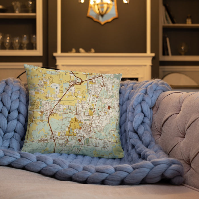 Custom Fayetteville Arkansas Map Throw Pillow in Woodblock on Cream Colored Couch