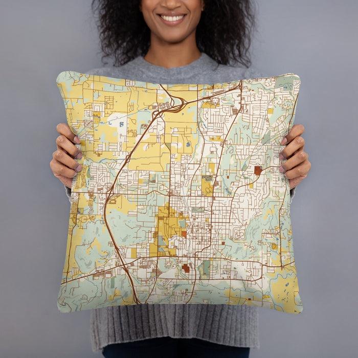Person holding 18x18 Custom Fayetteville Arkansas Map Throw Pillow in Woodblock