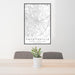 24x36 Fayetteville North Carolina Map Print Portrait Orientation in Classic Style Behind 2 Chairs Table and Potted Plant