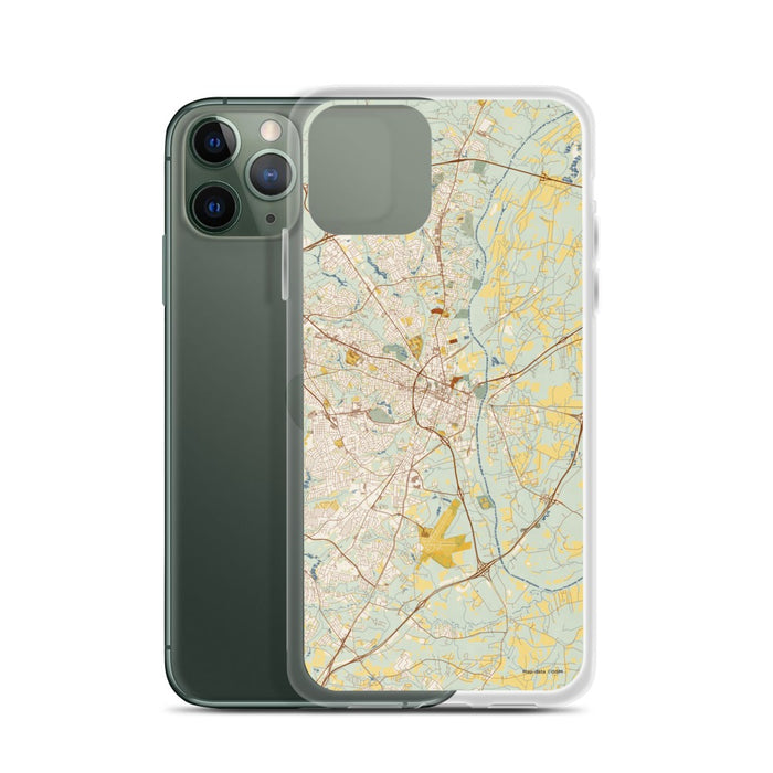 Custom Fayetteville North Carolina Map Phone Case in Woodblock on Table with Laptop and Plant
