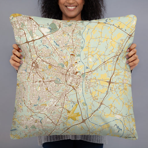 Person holding 22x22 Custom Fayetteville North Carolina Map Throw Pillow in Woodblock