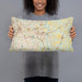 Person holding 20x12 Custom Fayetteville North Carolina Map Throw Pillow in Woodblock