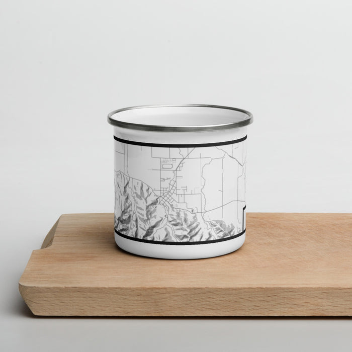 Front View Custom Ferndale California Map Enamel Mug in Classic on Cutting Board