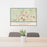 24x36 Fitchburg Massachusetts Map Print Lanscape Orientation in Woodblock Style Behind 2 Chairs Table and Potted Plant