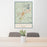 24x36 Flagstaff Arizona Map Print Portrait Orientation in Woodblock Style Behind 2 Chairs Table and Potted Plant