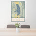 24x36 Flathead Lake Montana Map Print Portrait Orientation in Woodblock Style Behind 2 Chairs Table and Potted Plant
