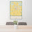 24x36 Floydada Texas Map Print Portrait Orientation in Woodblock Style Behind 2 Chairs Table and Potted Plant