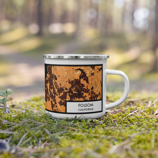 Right View Custom Folsom California Map Enamel Mug in Ember on Grass With Trees in Background