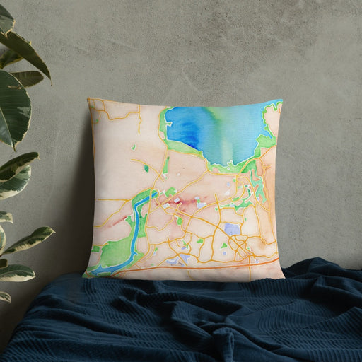 Custom Folsom California Map Throw Pillow in Watercolor on Bedding Against Wall