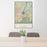 24x36 Folsom California Map Print Portrait Orientation in Woodblock Style Behind 2 Chairs Table and Potted Plant