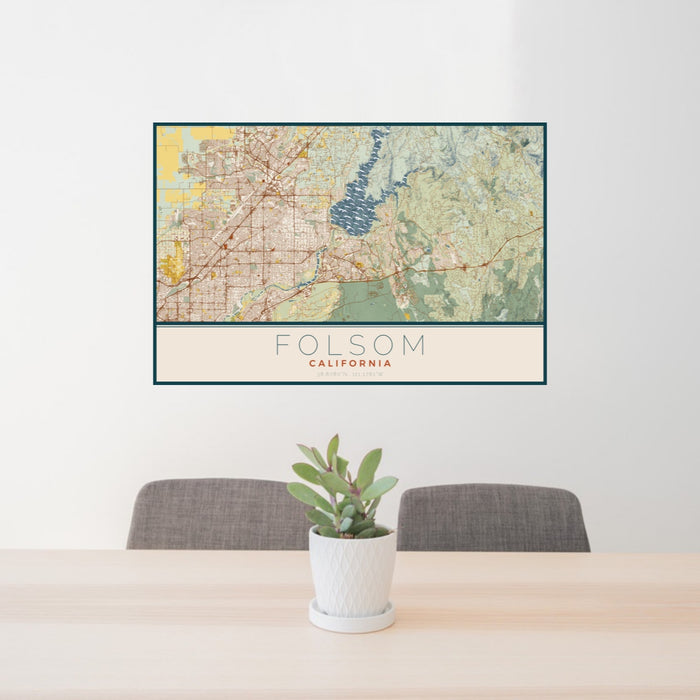 24x36 Folsom California Map Print Landscape Orientation in Woodblock Style Behind 2 Chairs Table and Potted Plant