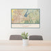24x36 Folsom California Map Print Landscape Orientation in Woodblock Style Behind 2 Chairs Table and Potted Plant