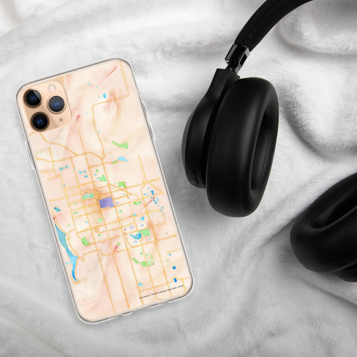 Custom Fort Collins Colorado Map Phone Case in Watercolor on Table with Black Headphones