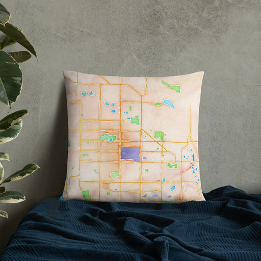 Custom Fort Collins Colorado Map Throw Pillow in Watercolor on Bedding Against Wall