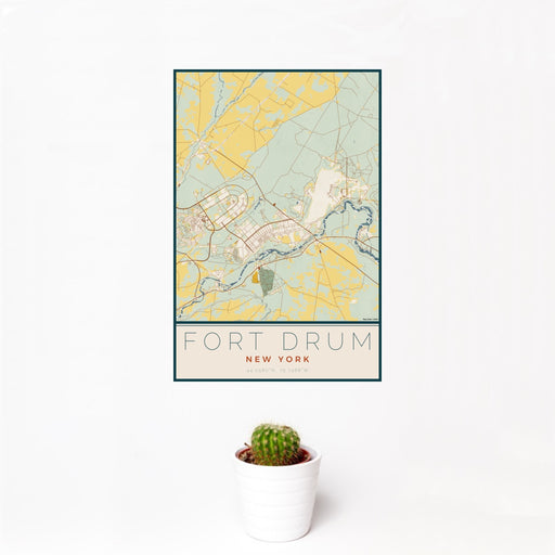 12x18 Fort Drum New York Map Print Portrait Orientation in Woodblock Style With Small Cactus Plant in White Planter