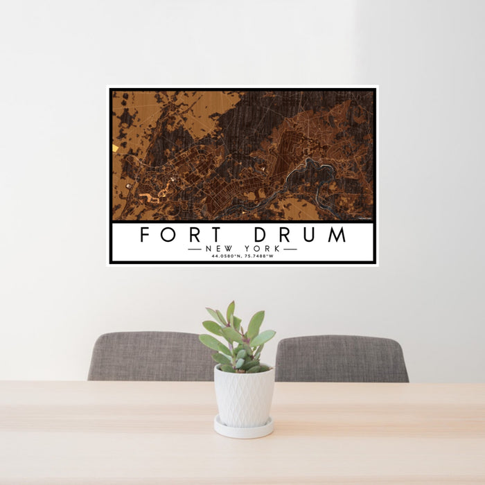 24x36 Fort Drum New York Map Print Lanscape Orientation in Ember Style Behind 2 Chairs Table and Potted Plant