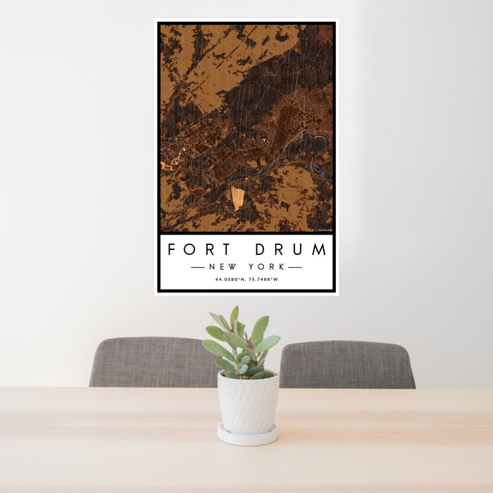 24x36 Fort Drum New York Map Print Portrait Orientation in Ember Style Behind 2 Chairs Table and Potted Plant