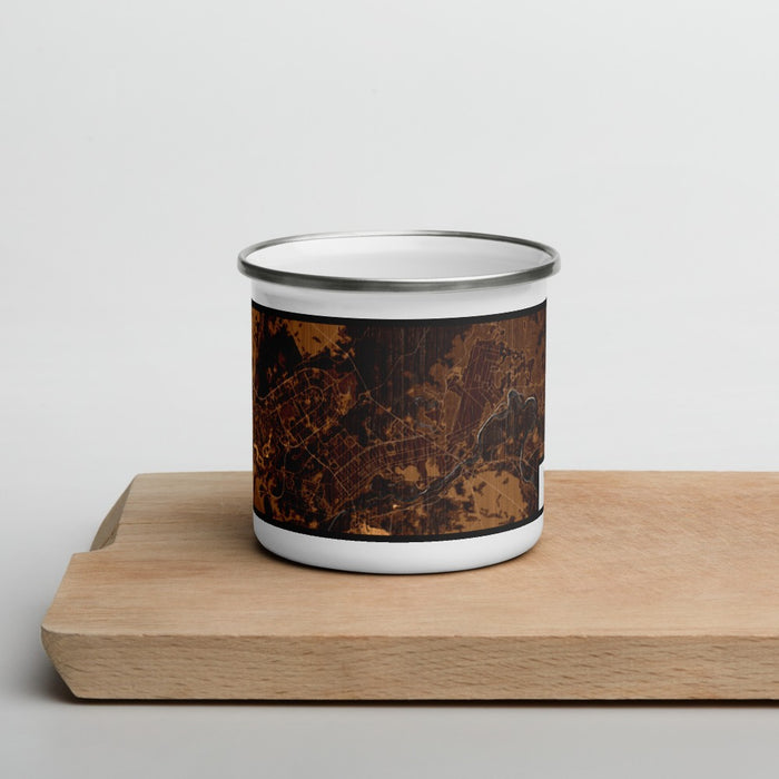 Front View Custom Fort Drum New York Map Enamel Mug in Ember on Cutting Board