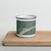 Front View Custom Fort Madison Iowa Map Enamel Mug in Afternoon on Cutting Board