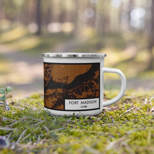 Right View Custom Fort Madison Iowa Map Enamel Mug in Ember on Grass With Trees in Background