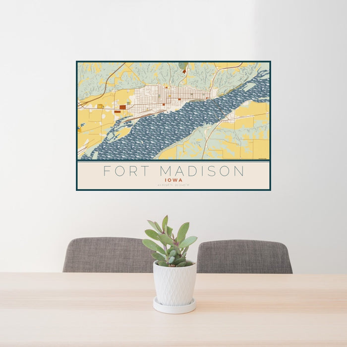 24x36 Fort Madison Iowa Map Print Landscape Orientation in Woodblock Style Behind 2 Chairs Table and Potted Plant
