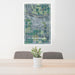 24x36 Fort Morgan Colorado Map Print Portrait Orientation in Afternoon Style Behind 2 Chairs Table and Potted Plant
