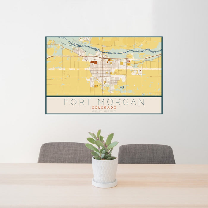 24x36 Fort Morgan Colorado Map Print Lanscape Orientation in Woodblock Style Behind 2 Chairs Table and Potted Plant