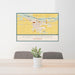 24x36 Fort Morgan Colorado Map Print Lanscape Orientation in Woodblock Style Behind 2 Chairs Table and Potted Plant