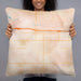 Person holding 22x22 Custom Fort Morgan Colorado Map Throw Pillow in Watercolor