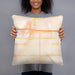 Person holding 18x18 Custom Fort Morgan Colorado Map Throw Pillow in Watercolor